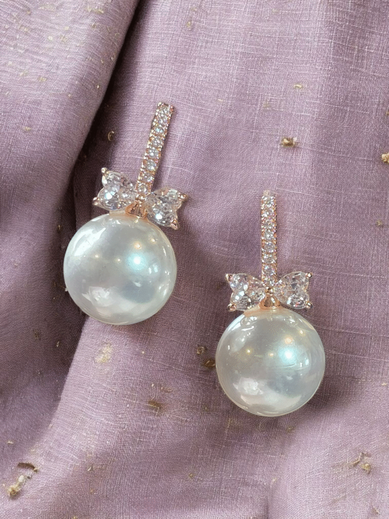 Lustrous Pearl with Sparkling Crystal Wings Studs