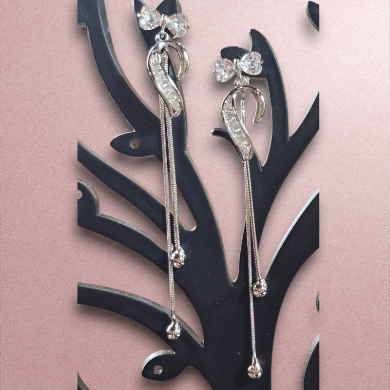 Elegant Shimmering Ribbon Drop Danglers with Crystal Bow Studs - Image 3