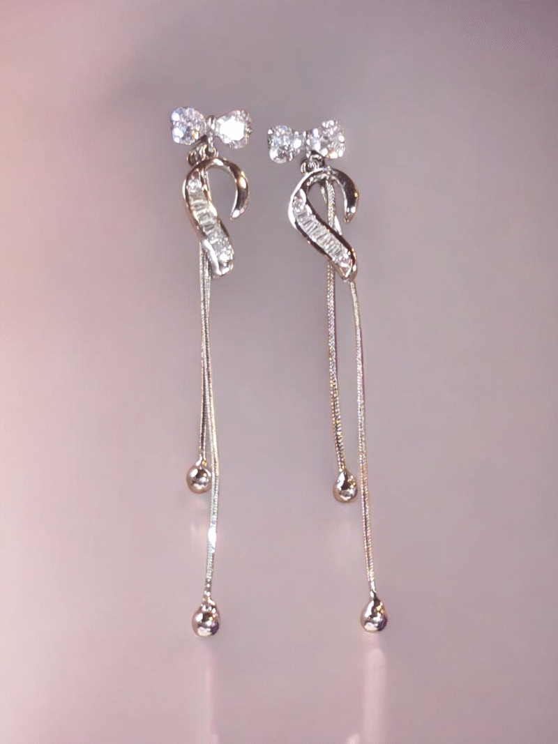 Elegant Shimmering Ribbon Drop Danglers with Crystal Bow Studs