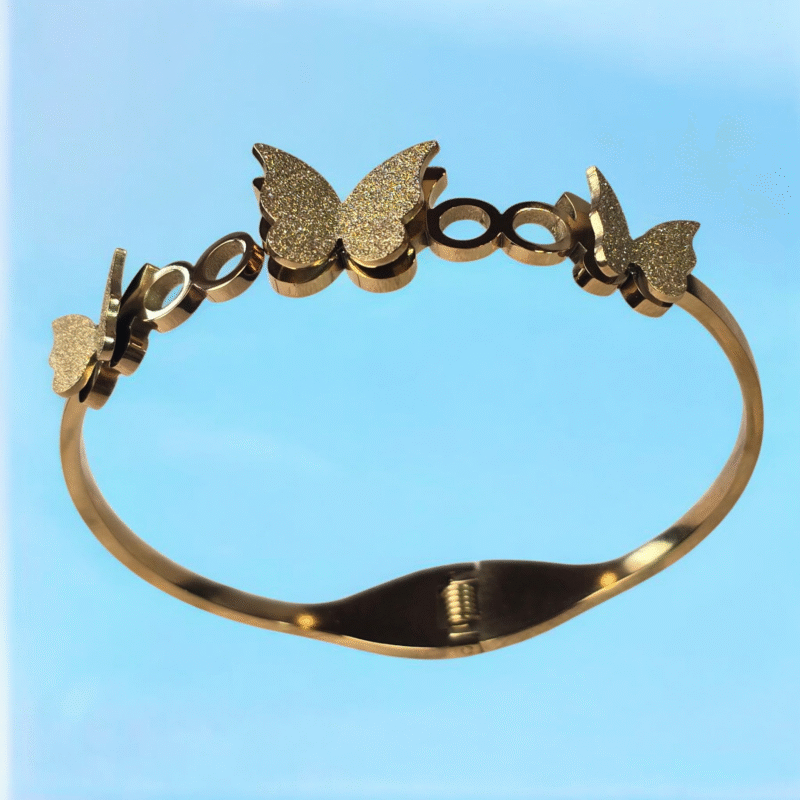 Golden Flutter Harmony Bangle with Textured Glitter Butterfly Motifs - Image 8