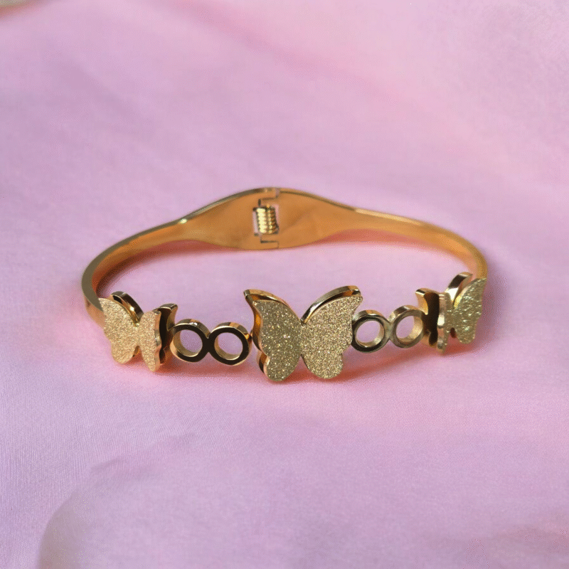 Golden Flutter Harmony Bangle with Textured Glitter Butterfly Motifs - Image 10