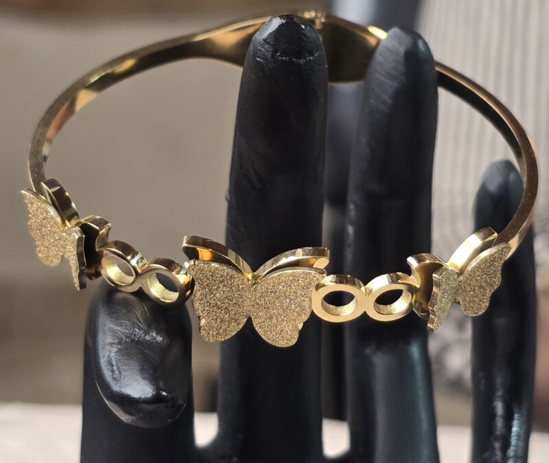 Golden Flutter Harmony Bangle with Textured Glitter Butterfly Motifs - Image 3