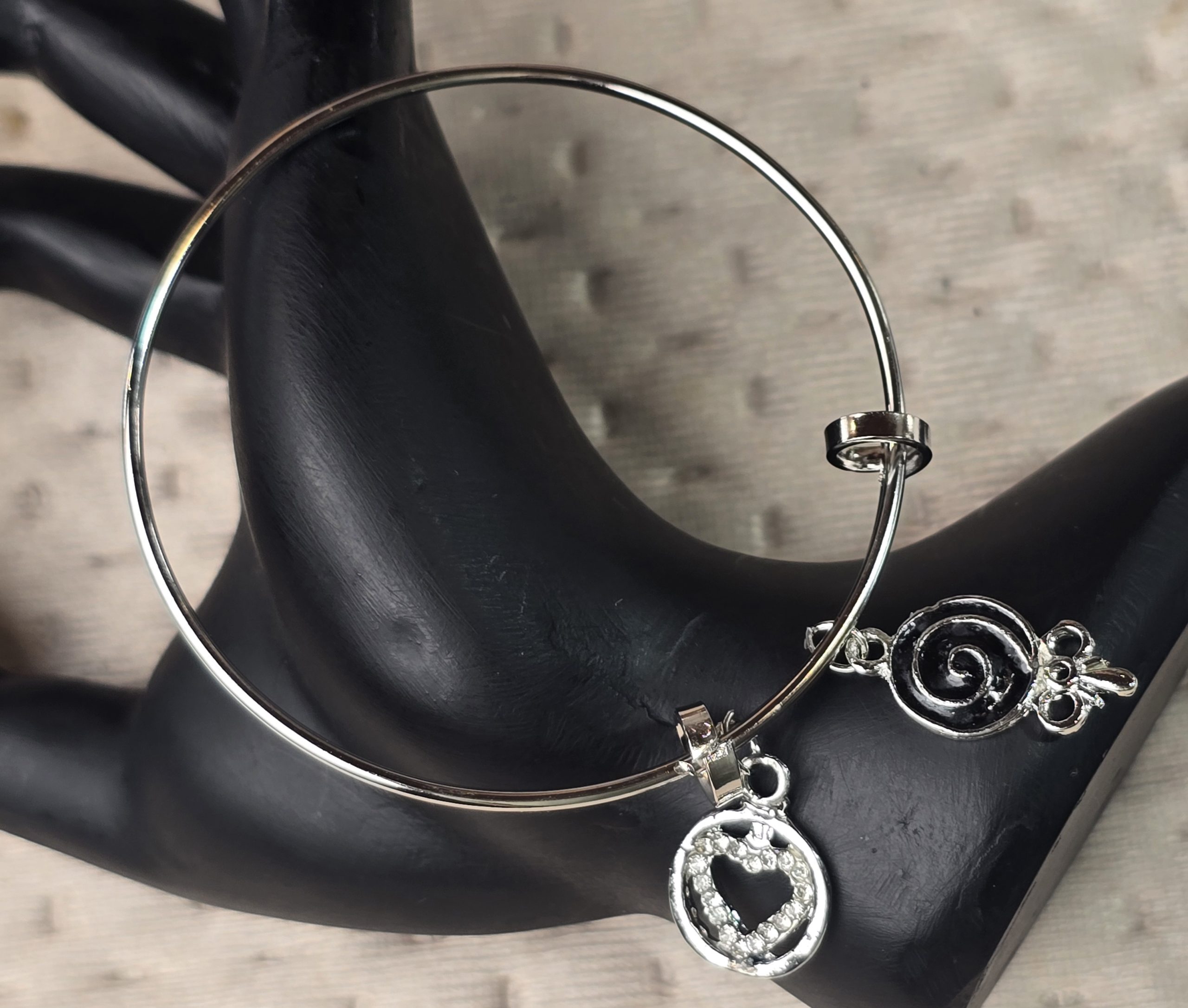 Silver Textured Bangle with Sculpted Heart and Swirl Charms
