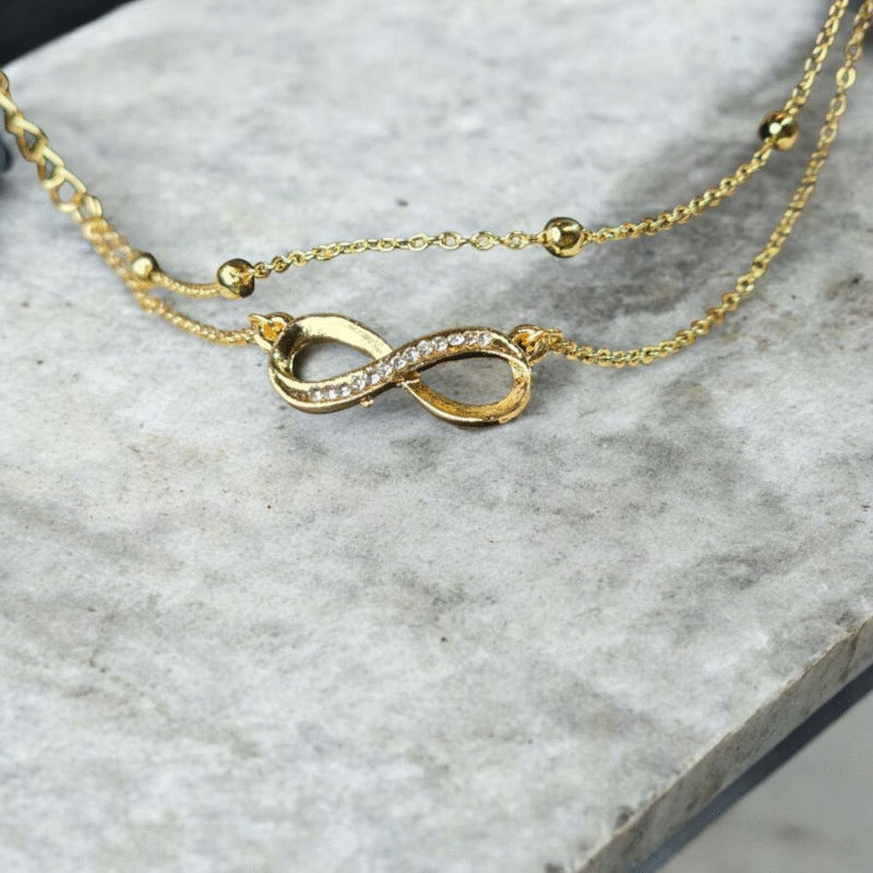 "Endless Radiance Gold Infinity Link Dual Layered Bracelet" - Image 3