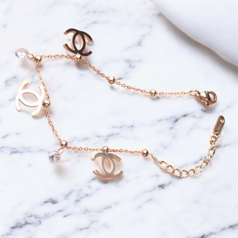 Rose Gold Logo Charm Bracelet with Crystal Droplets - Image 8