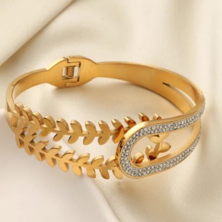 Gold Leaf Motif Bangle with Crystal-Embellished Curved Clasp
